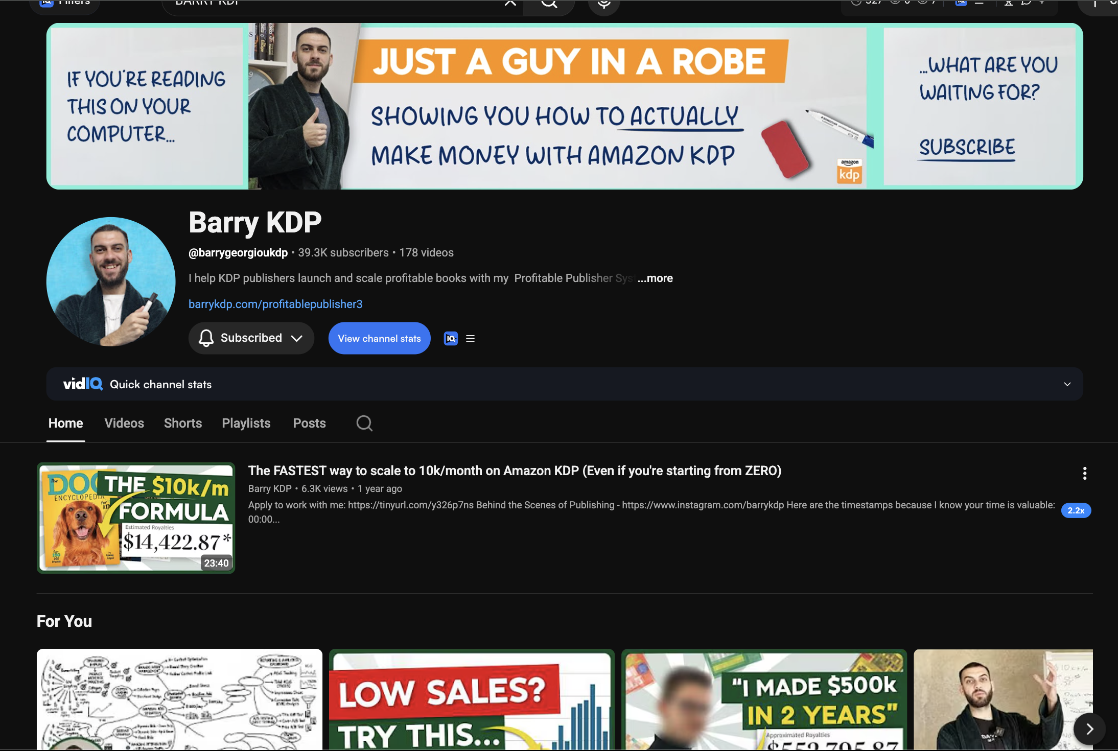Barry KDP teaching on whiteboard in robe — Profitable Publisher System